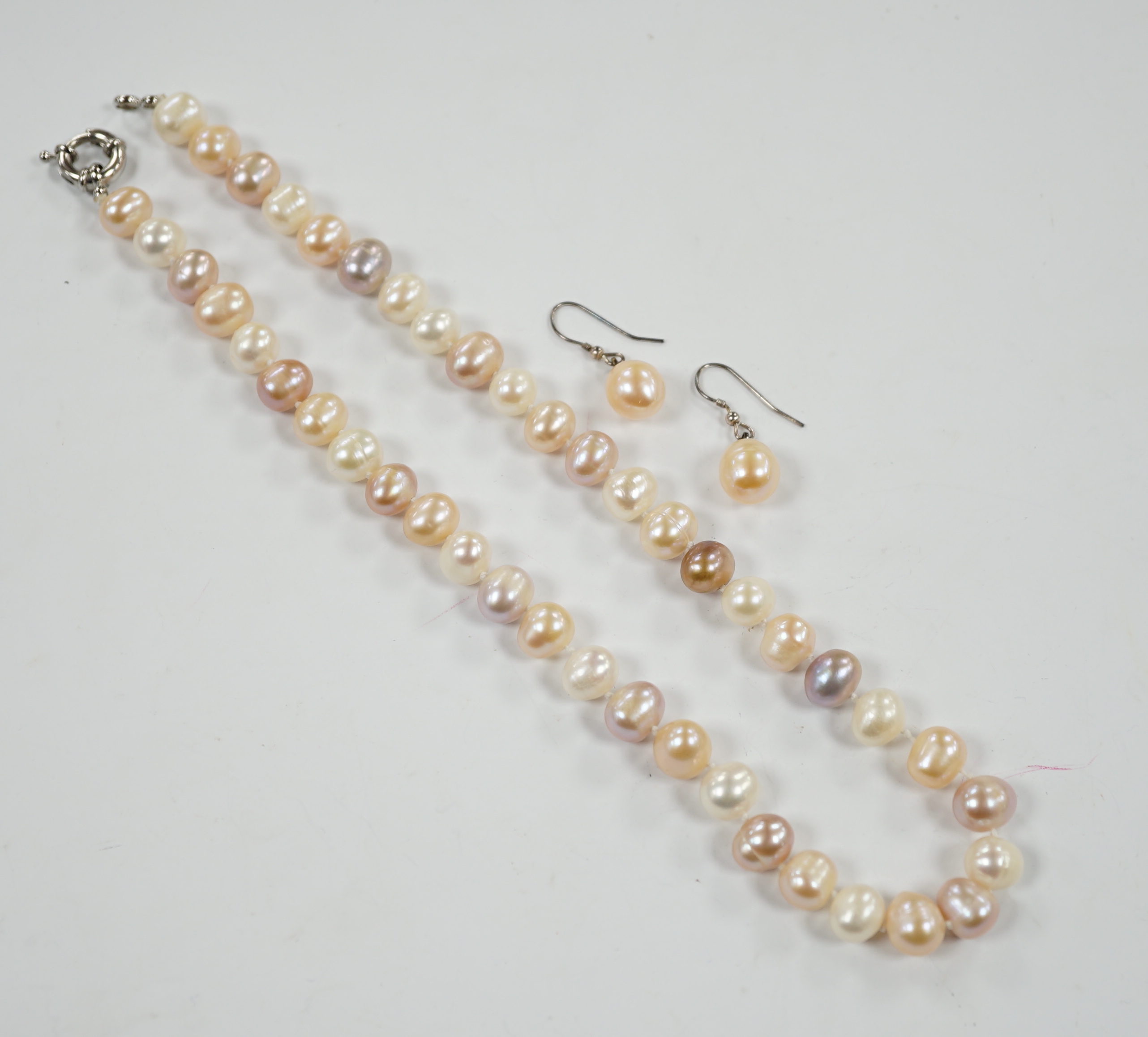 A single strand multi coloured freshwater pearl necklace, 44cm and a pair of freshwater pearl drop earrings.